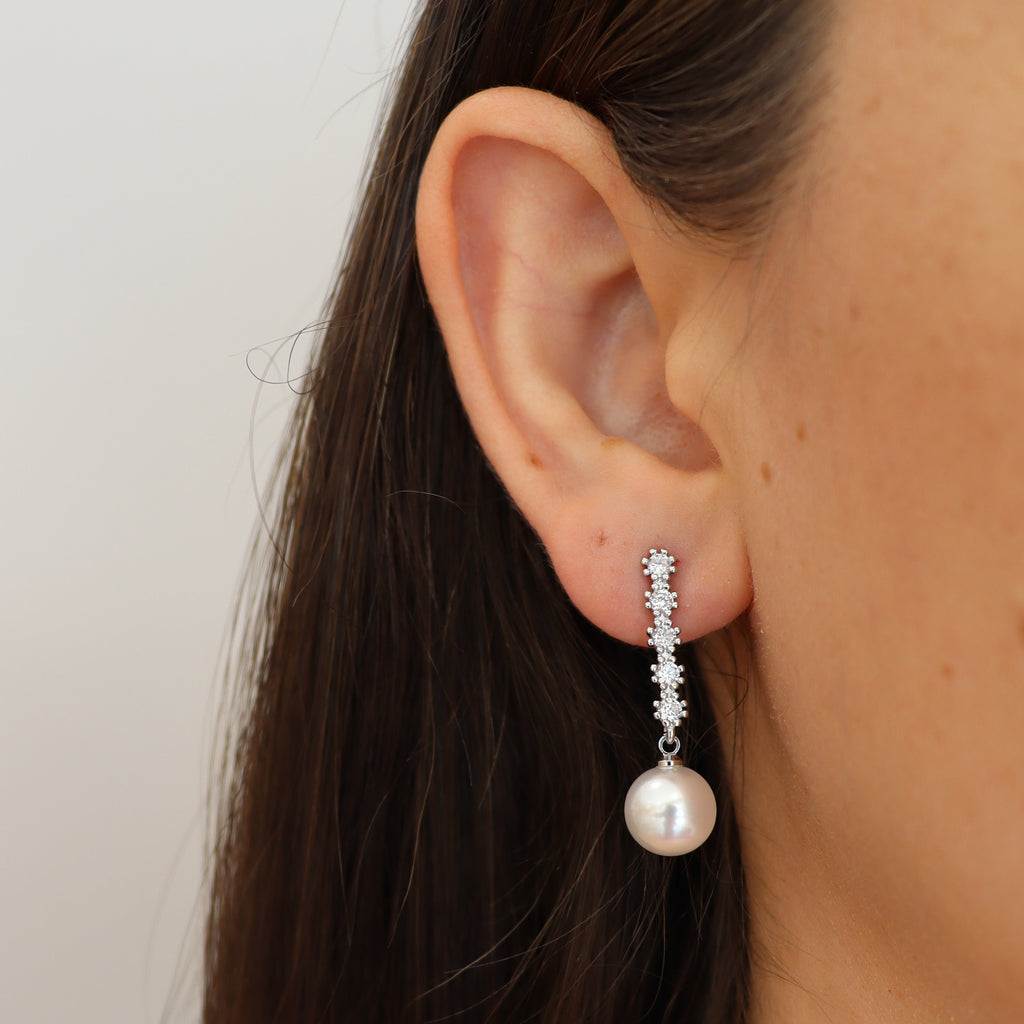 ARETES UNIQUE BRILLOS CON PERLA FIESTA