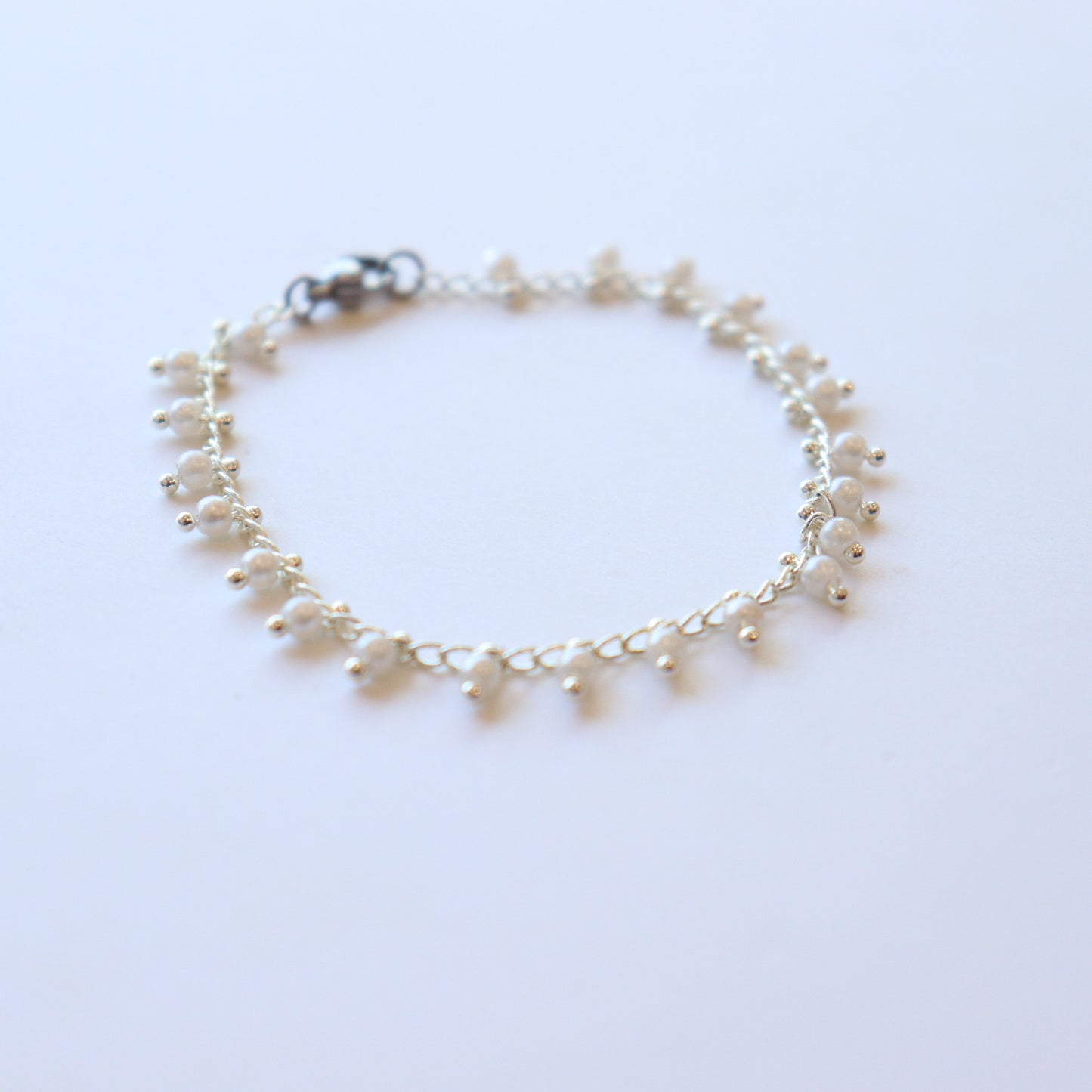 PULSERA PERLA COLGANTE PLATEADOS